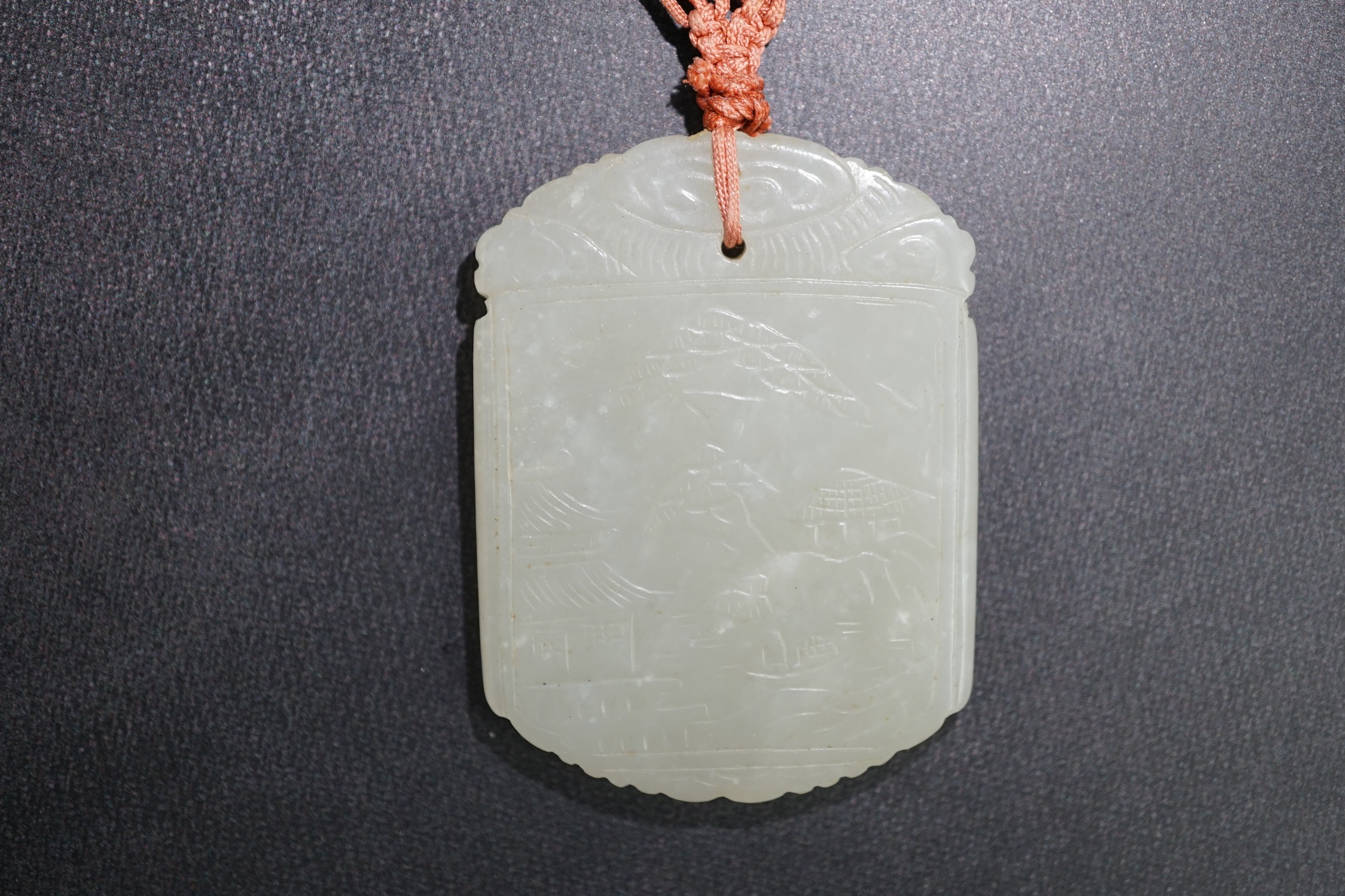 An unusual Chinese pale celadon jade plaque, 19th century